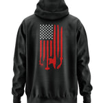 Black hoodie with a red and white flag design on the back with welding tools for the stripes and an American Flag with welding ribbon on the front chest. 