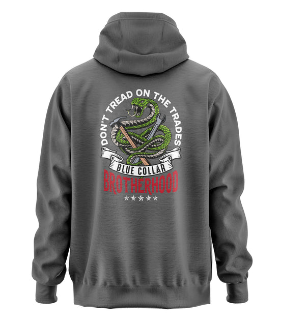 Don't Tread on Trades Proud Hooded Sweatshirt in black, gray or blue, featuring bold yellow and white lettering with a tough 'Don’t Tread on Me' inspired design. Ideal for skilled tradesmen, including electricians, welders, and carpenters. Heavyweight, durable material for year-round comfort and protection on the job site. Show pride in the trades with this iconic hoodie.